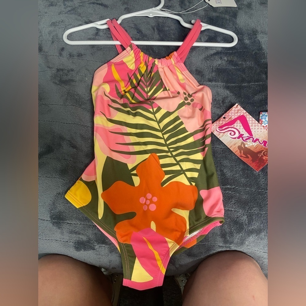 3 available, size 4. Kanu surf one piece bathing suits